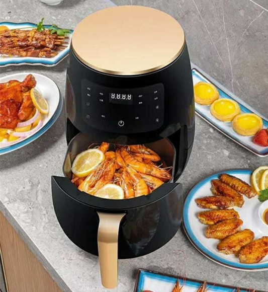 Curvy Waist SA Air Fryer 6L basket filled with cooked shrimp, served alongside wings and tarts