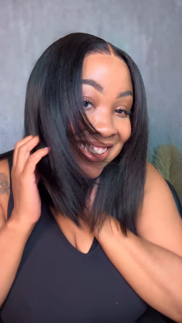 Curvy Waist SA 10 inch human hair bob wig customer photo - smiling touching hair